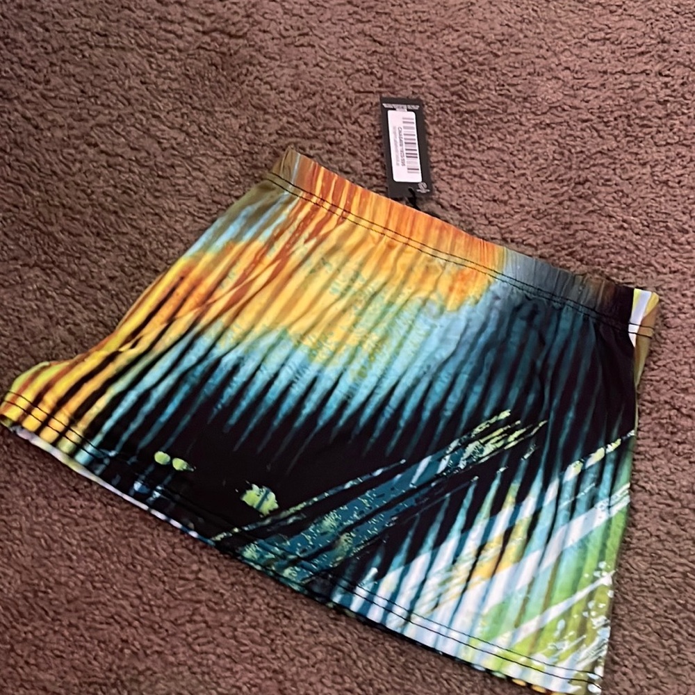 Multi body print low rise micro mini skirt. BRAND NEW!